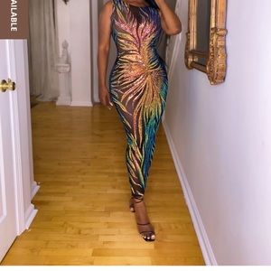 perfect mix of sequins and nylon this midi dress